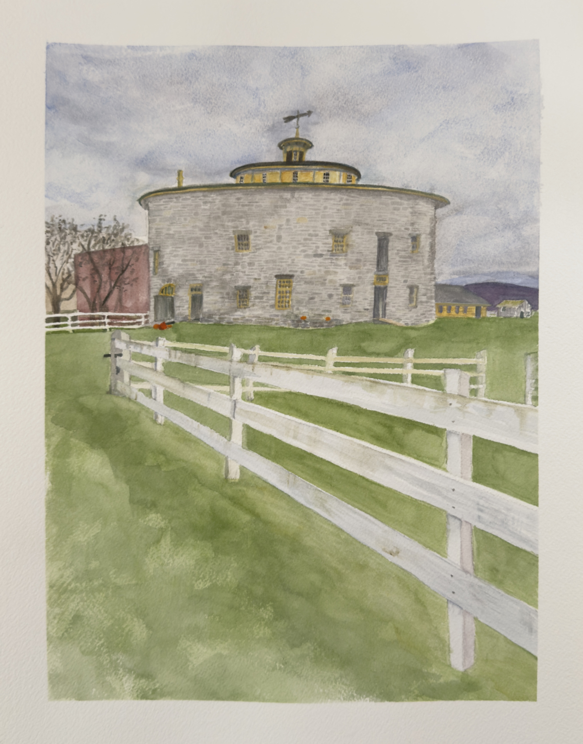 Watercolor painting of the round barn at Hancock Shaker Village